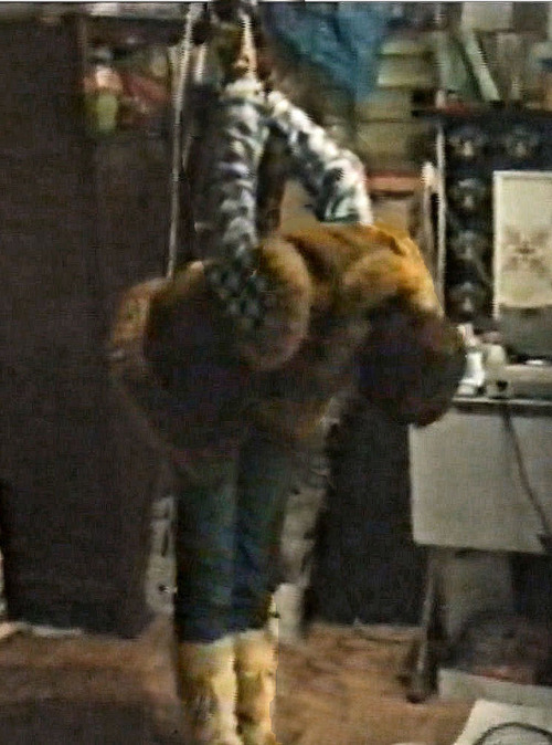 July 12 - 8.00 PMFur boots, a shirt, a tie, wool gloves, a fully lined sheepskin sleeveless vest, a 
