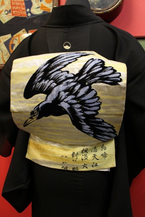 Beautiful crow vintage obi, paired with a summer kurotomesode depicting insects mimicing a daimyo pr