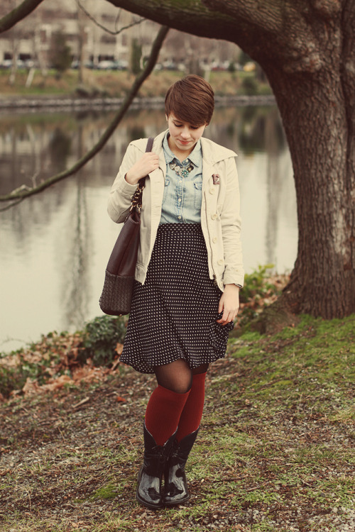 Black sheer pantyhose with red knee socks and black skirt with white polka dot print