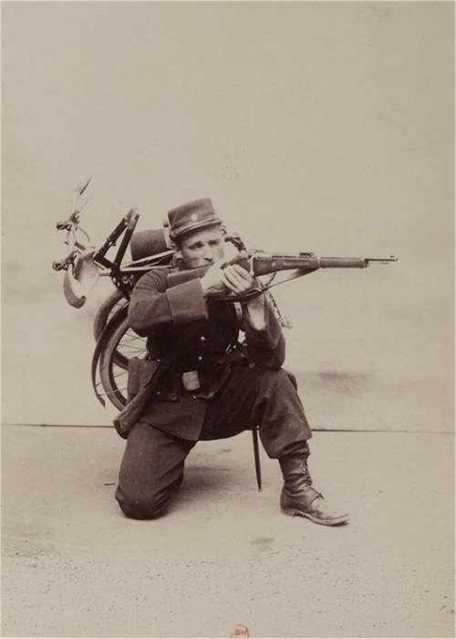 A French bicycle infantryman with Gladiator folding bike, circa 1896.