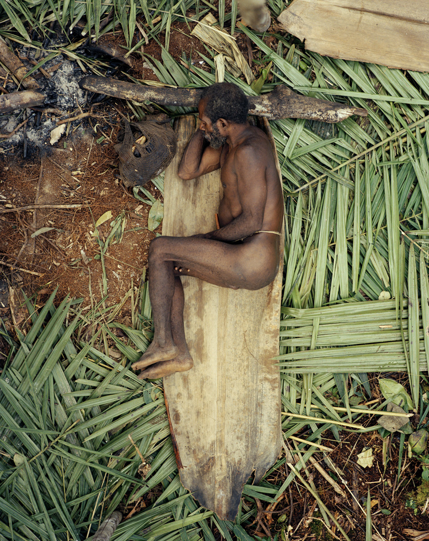 fredericlagrangephotography:  Kombai hunter at rest  |  Irian Jaya, Indonesia www.fredericlagrange.com