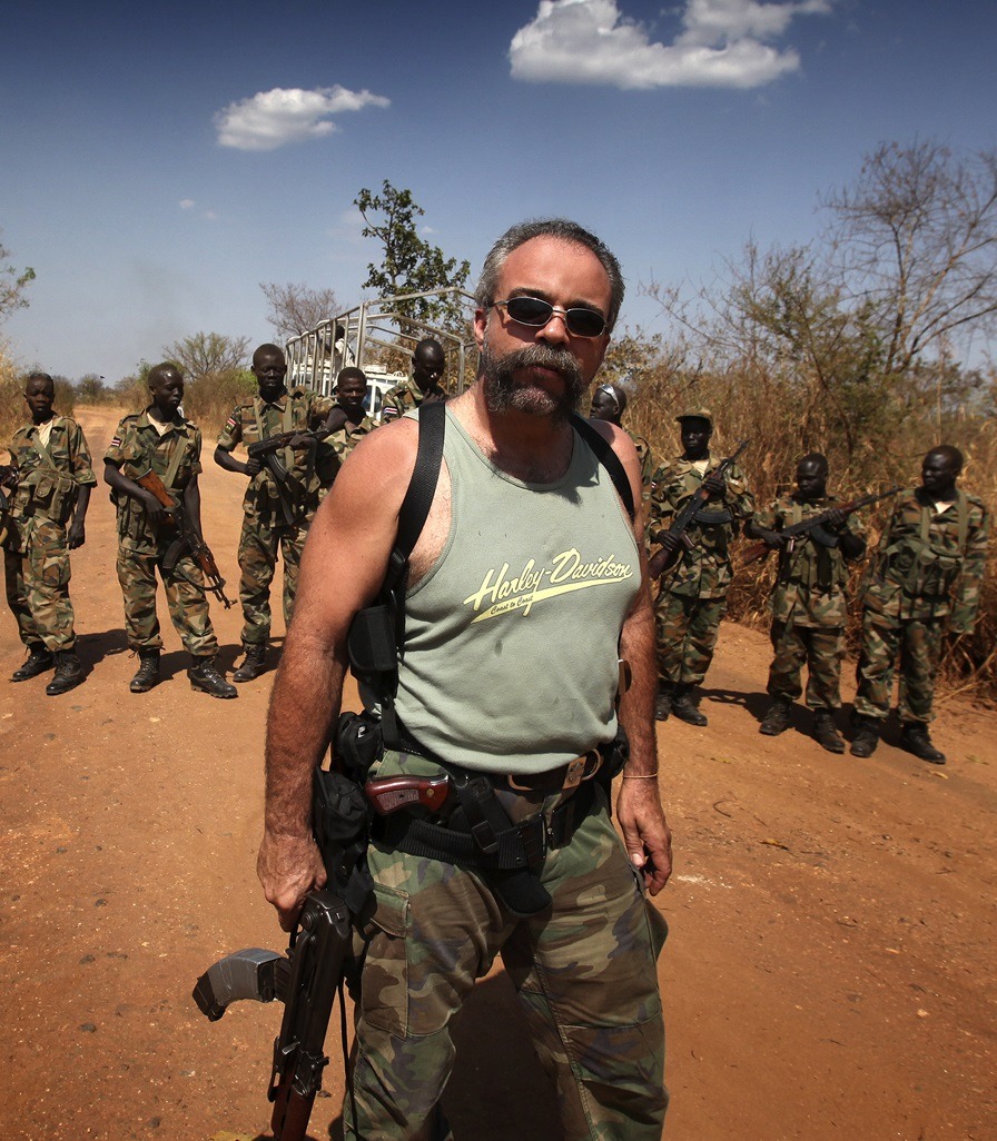 titovka-and-bergmutzen:  fnhfal:  The “machine gun preacher” with the south Sudanese