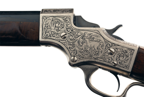 Engraved Stevens No.49 single shot target rifle with scope, late 19th century.