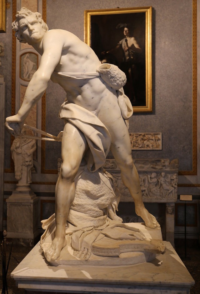 m1male2:David by Gian Lorenzo Bernini (1598-1680) one of the greatest baroque geniuses of his time.  Made in marble, the sculpture dates from 1623-24.  The work was commissioned by Cardinal Scipione Borghese, one of the sculptor’s patron and is