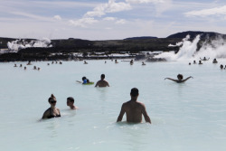 Unrar:  People Lounging In The Blue Lagoon, Iceland, Jill Schneider. 