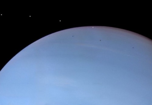 This view of Despina eclipsing and transiting Neptune is composed of four frames captured nine minut
