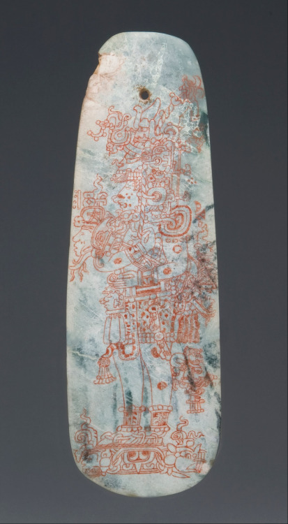 historyarchaeologyartefacts:A jade royal belt ornament representing a full-length profile portrait o