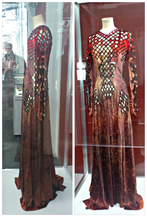 costumeloverz71: Morgana (Helen Mirren) Red cutout dress… Excalibur (1981).. Costume by Bob Ringwood