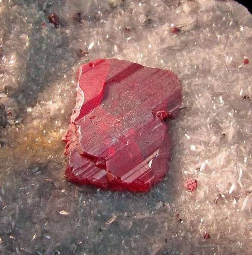 Cinnabar on Quartz Sulphide ores are most often dull and grey, so the bright red colours of this tox