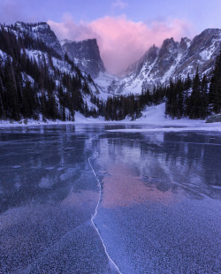 americasgreatoutdoors:A lavender sunrise reveals the marbled and cracked surface of Dream Lake at Rocky Mountain National Park in Colorado. If not for the chill, this would be the most beautiful floor in the world. Photo courtesy of Eric Schuette.