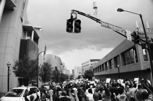 stephenphilms:  August 18th 2014 in Atlanta Georgia a peaceful Rally for the Justice of murdered unarmed teen Michael Brown took place. Michael Brown was shot 6 times in the street by a cop in Ferguson Missouri.  As the rain poured down a group of a