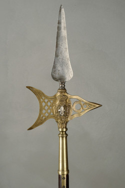 art-of-swords:  Officer’s Halberd Dated: second quarter of the 19th century Provenance: Duchy of Parma Measurements: overall height 190 cm The halberd has a leaf-shaped, double-edged, iron cusp, with a ribbed tip and knotted neck. The small axe and