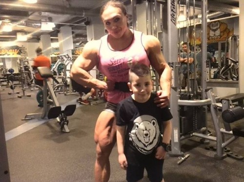 zimbo4444:  ..Natalia Trukhina..”The World’s Most Muscular Woman”..super strong & super beautiful & only 24yo..slightly over 5'5” tall 211 lbs & has over 18″ biceps.. 💪🏼😺👍🏼 ..Jr. proudly says..”my Mom can beat up