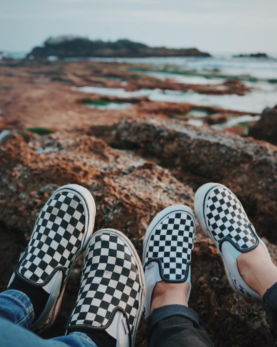 vans checkerboard slip on girls