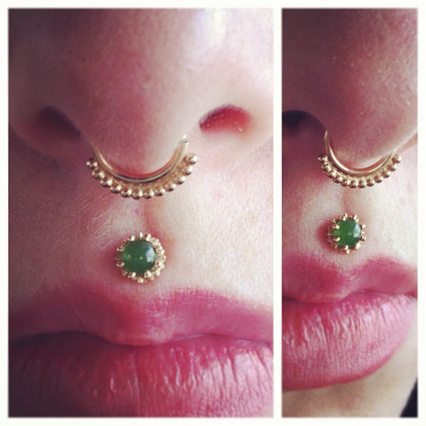 youhaveneverbeenright:  thegirlbehindthecamera:  Yellow gold lakshmi ring and nephrite