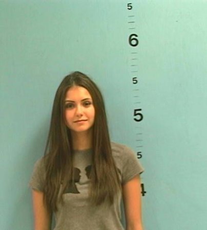 uglyplastic:  Photo courtesy: Unknown Charge(s): Nina Dobrev arrested for disorderly conduct (flashing her boobs to incoming traffic from the top of a bridge with other cast mates from vampire diaries)