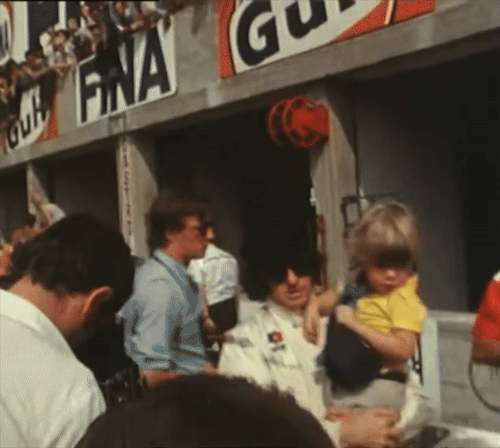 JACKIE STEWART, With His Son PAUL, Talking To GRAHAM HILL At The 1969 ITALIAN GRAND PRIX
