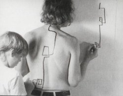  Dennis Oppenheim, Two Stage Transfer Drawing  “As I run a marker along Eric’s s back he attempts to duplicate the movement on the wall. My activity stimulates a kinetic response from his sensory system. I am, therefore, Drawing Through Him.” 
