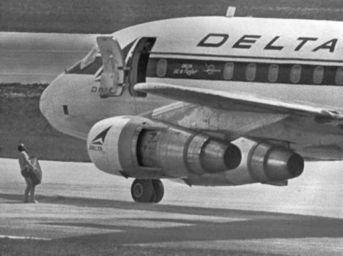 A Half-naked FBI Agent Carries A Case With $1 Million Ransom To A Hijacked Delta DC8 Jet In Miami, 1972.