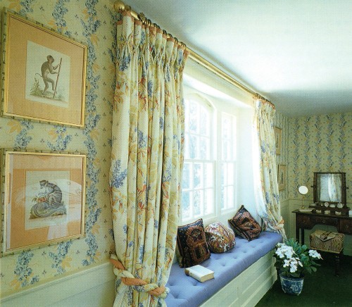 An English country house is the natural habitat of flowered chintz. Here the light and airy main bed