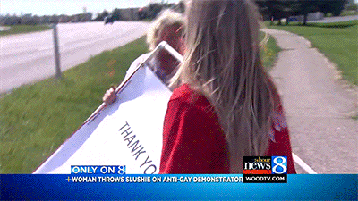 cumsockmonkey:huffingtonpost:Anti-gay mother’s day protester gets slushie thrown at her. See the ful