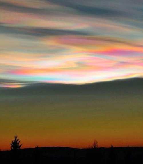 Polar stratospheric cloudsFormed at icy temperatures (-85 C) high up in the stratosphere (some 25km 