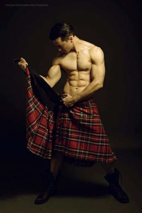 Men in kilts with tattoos