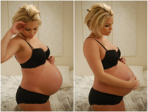 sizebreed:Goddamn….her face….it shows she knows how much her huge, perfect belly turns