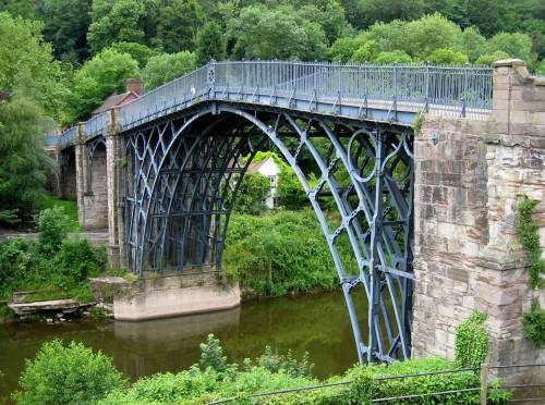 The Iron Bridge crosses the River Severn in Shropshire, England. It was the firstarch bridge in the 