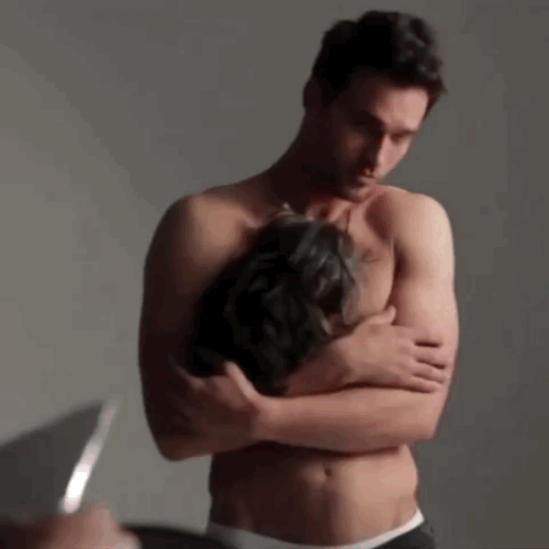 tabloidheat101:  Brett Dalton Shirtless Cuddling A Puppy 