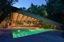 npr:  One of the most dramatic homes in Los Angeles has just been donated to the Los Angeles County Museum of Art. Designed in 1961 by John Lautner — an influential Southern California architect — the glass and concrete house clings to the side of