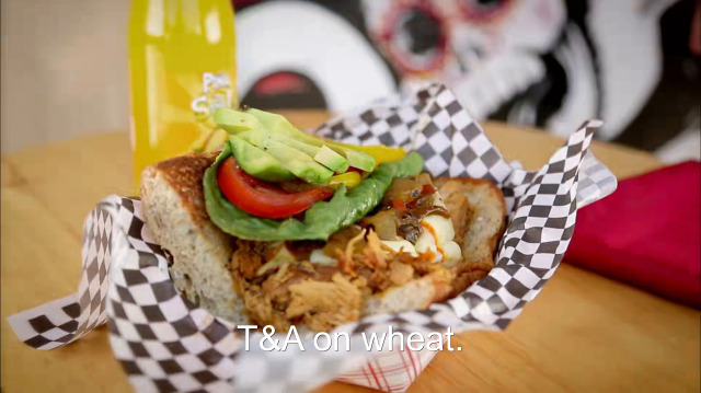 98% sure it's a close up of a plate of food on a table. Caption: T&A on wheat.