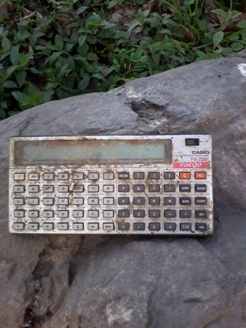 ‘80′s Casio Fuego FX 702 calculator. Found on the woods