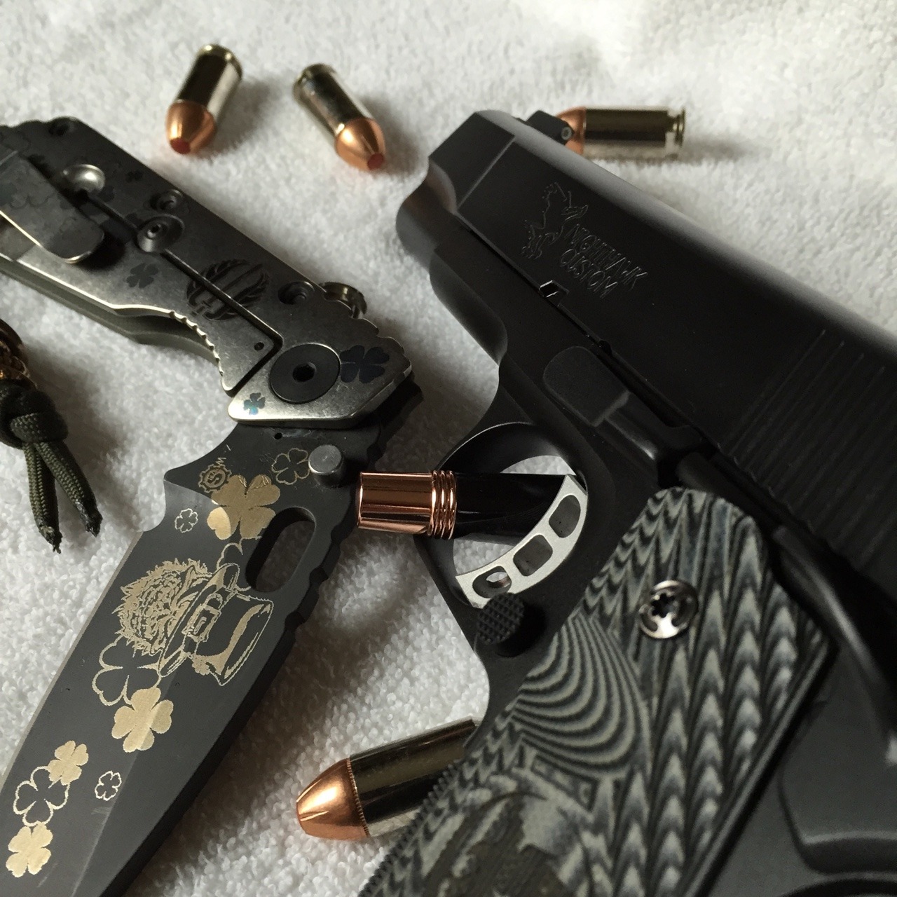 gunsknivesgear:  Nighthawk Custom Falcon Commander 45 acp. Strider frame lock knife.