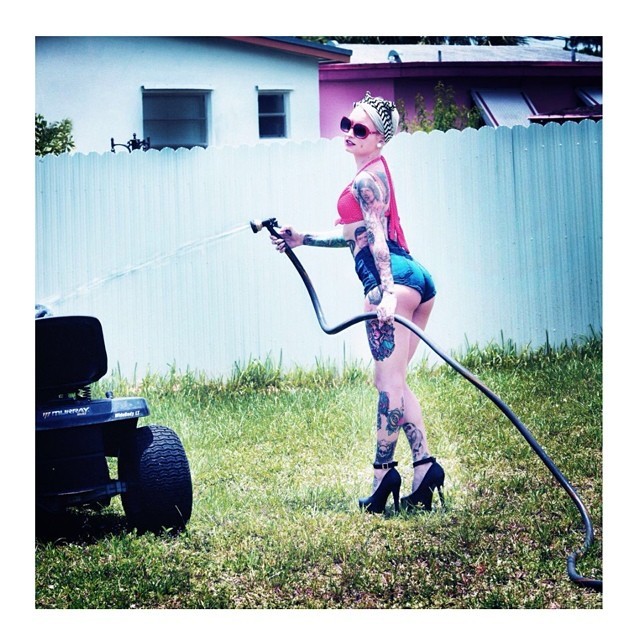 vanyvicious:  Oh you know , just washing lawn mowers lol .. Photo by @erikanellyphotography !