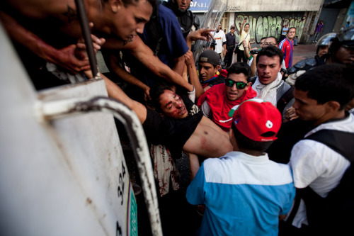 riotsandrhymes:Help! Venezuela has Become a war zone. The government and its armed groups, the army 