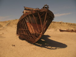 abandoned-playgrounds:  The rusted and abandoned ships outside of Muynak on the diminished Aral Sea. Full story —-&gt; http://www.abandonedplaygrounds.com/the-rusting-and-abandoned-ships-of-the-aral-sea/