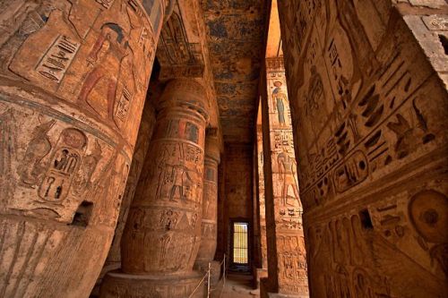 Medinet Habu View of the west portico with painted columns, pillars and ceiling, details from the se