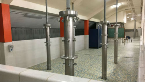 Boy’s showers at Evanston Township High School, Illinois.Sadly, the school district plans to rip the