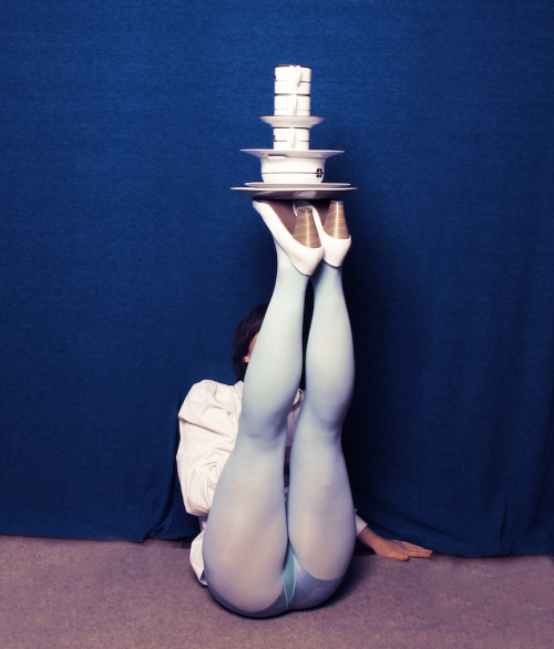 aerbor:  POSITIONS BY ISABELLE WENZEL  German photographer Isabelle Wenzel sets up surreal scenes in which she requests her sitters to engage in a very physical pose: they hang upside down, contort like acrobats or stick their high-heeled legs out of