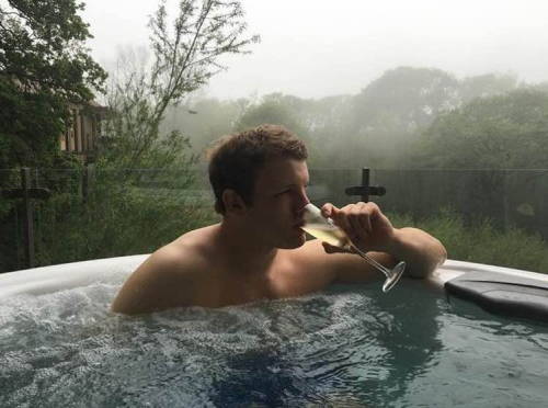 drakestories:  straightdad8:My handsome son after he’d swallowed two balls worth of my dad cum.  “There… that’s not so bad, is it?” I laughed as Drew leaned back into the bubbling water and reached for the champagne flute. This getaway was