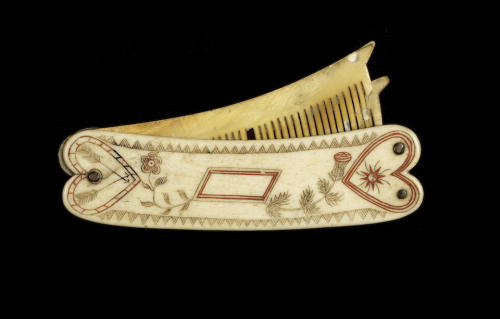 ltwilliammowett: A scrimshawed and polychromed double comb, sailors love token, British, mid 19th ce