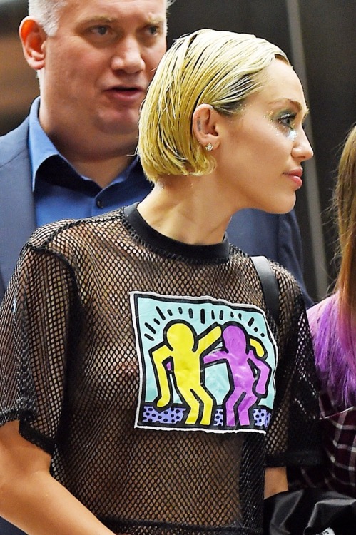 XXX : Miley Cyrus - see-thru shirt out in NYC. photo