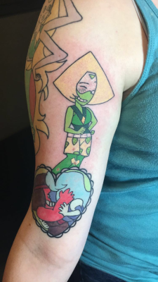 My artist added the boxers lolHere it is! Oh my goodness!! X’D Honestly, never thought one of my Peridot drawings would become a tattoo. She came out great! 