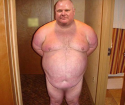 isrobfordgay:  More Photos from Rob Ford’s Personal Cell Phone have surfaced. In one he is standing naked in a hotel room right by the door, and in the other he is sitting cross legged in a hotel arm chair. It is not clear whether these photos were