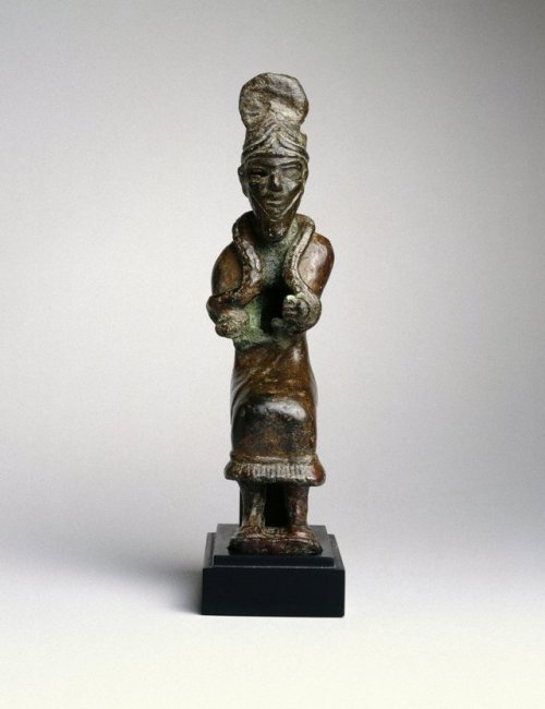 This small statuette represents a powerful, and international figure of the ancient world. The horns