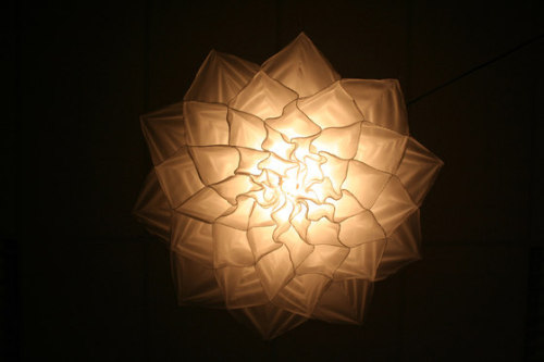 gaksdesigns:  ShylightCertain types of flowers close at night, for self-defense and to conserve their resources. This highly evolved natural mechanism is called nyctinasty, and inspired Studio Drift to create Shylight, a light sculpture that unfolds and