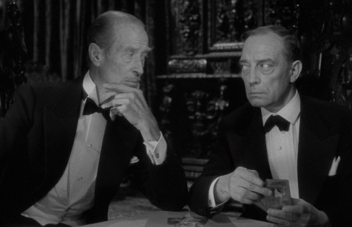HB Warner eyeballing Buster Keaton in ‘Sunset Boulevard’, 1950.  Stare all you like, that waxwork su