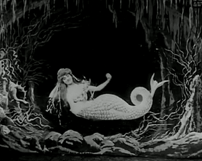 nitratediva:  Mermaid kisses from La Sirène, a 1904 Méliès film. 