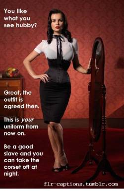 You like what you see hubby? Great, the outfit is agreed then.  This is your uniform from now on.   Be a good slave and you can take the corset off at night.   | Caption Credit: Uxorious Husband